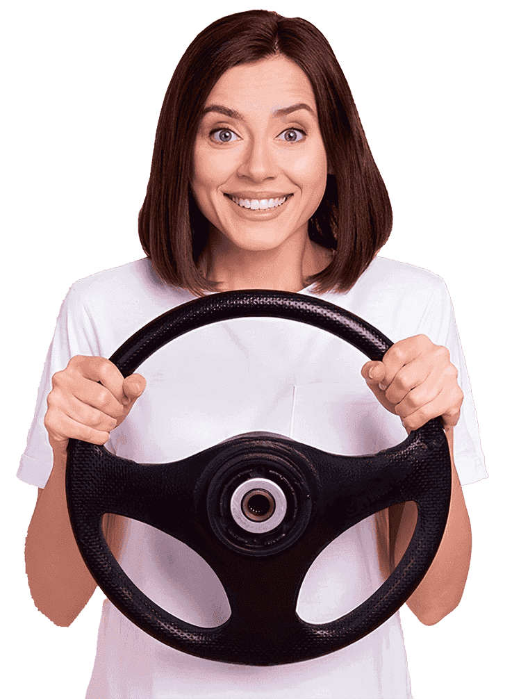 A student hoding the steering wheel.